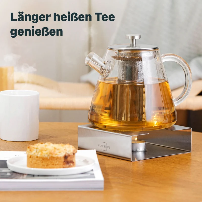 Teekanne aus Glas mit Stövchen