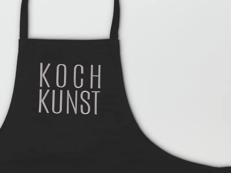 räder Schürze Kochkunst schwarz 78x70cm