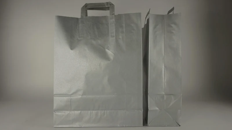 Silberne Krafttasche 35+14x40cm zu 50 Stück gedrehtes Handgelenk.
