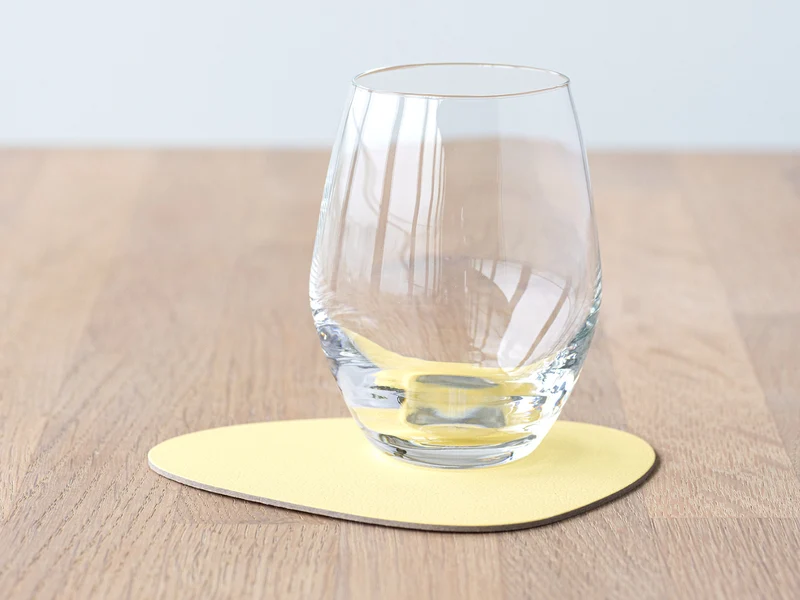 LIND DNA NUPO Untersetzer Curve yellow 11 x 13 cm